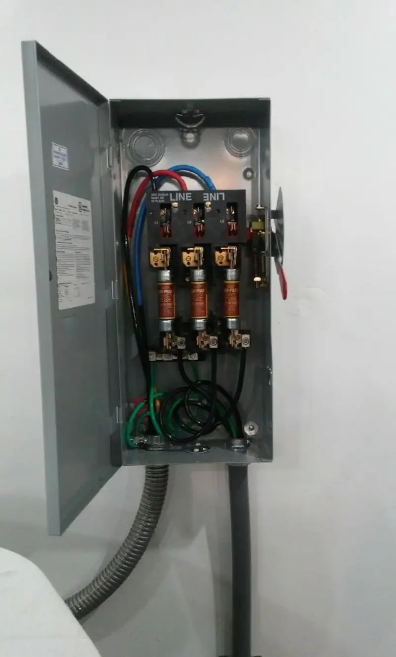 Three-phase disconnect switch installed for Smoke Detector Installation in Melbourne Beach